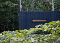 Shipping Container House in AMAGANSETT.  Small scaled shipping container hybrid architecture.