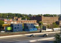 Box Office.  A Shipping Container Prefab Sustainable Green Office Building.  Mid-rise Shipping Container Architecture.